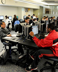 Students sitting at computers in a UMES computer lab.