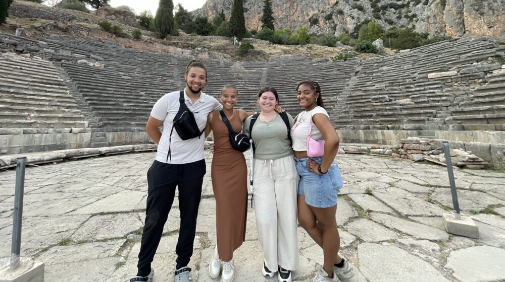 Four HBCU students pose for a photo in Greece.